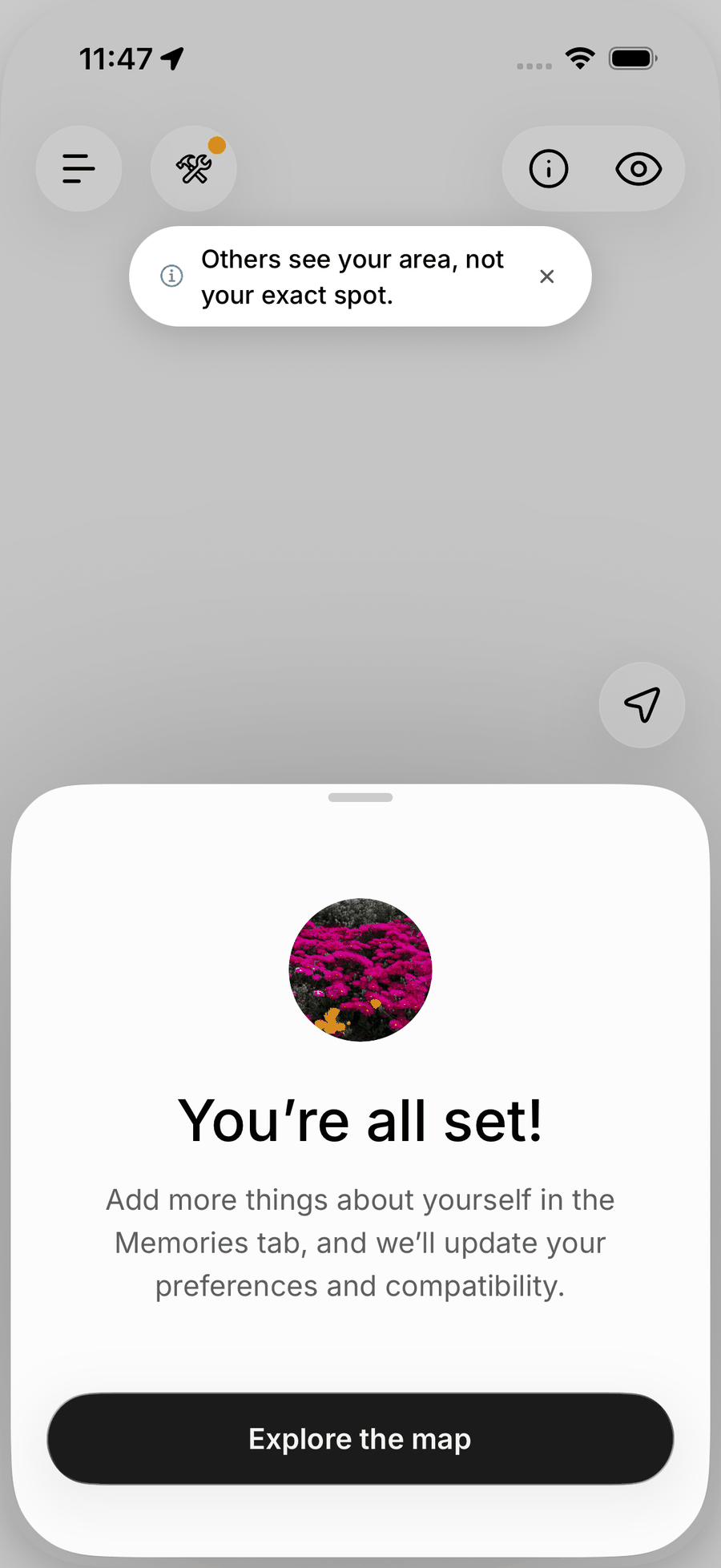 The You're all set screen on iOS with an Explore the map button and a banner saying others see your area, not your exact spot