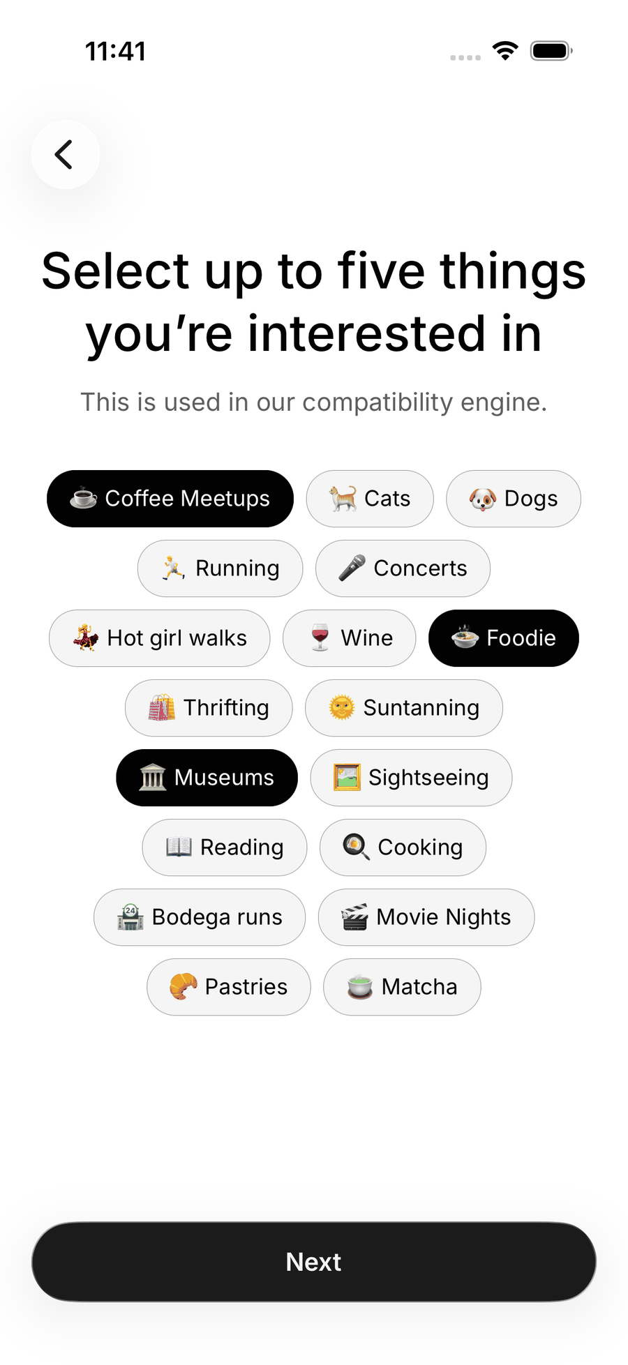 The interests step on iOS, Select up to five things you're interested in, with three chips selected